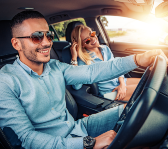 A man and a woman in a car
