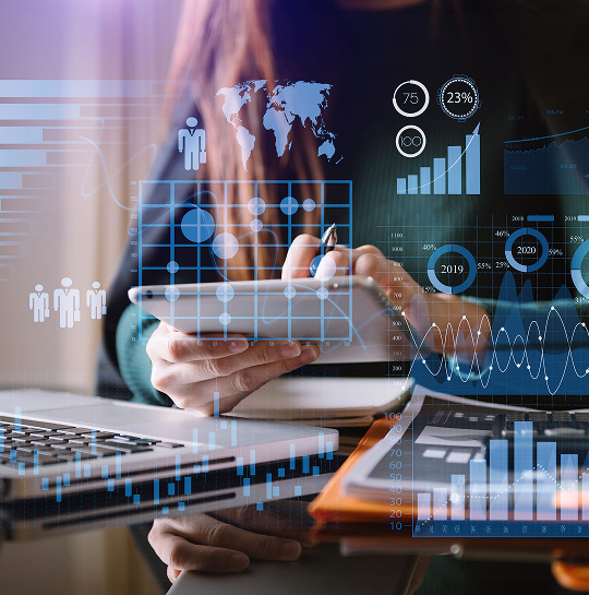 An image of a person on an ipad with lots of icons surrounding it representing reports and data.