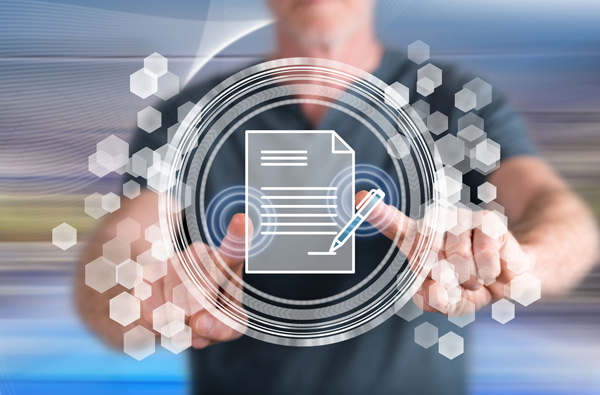 A person behind an icon representing the signing a digital document.